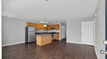 The View at Mackenzi Garden apartment kitchen, dining, and living room in York, PA – The View at Mackenzi