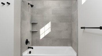Monte View at Pohatcong Luxury garden apartment second bathroom with a porcelain tile tub/shower in Pohatcong Twp, NJ – Monte View at Pohatcong