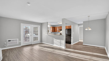 The Reserve at Copper Chase 1 bedroom apartment open living room, kitchen and dining area for rent in York, PA – The Reserve at Copper Chase
