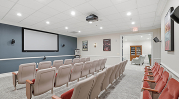 Horizons at the Village at Whitehall Community theater room with seating – Horizons at the Village at Whitehall | 55+ Community in Lehigh County, PA