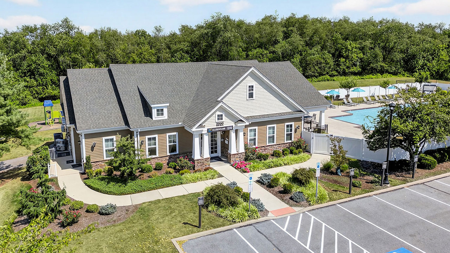 Exterior view of the clubhouse at The Oaks and Reserve at Copper Chase in York, PA