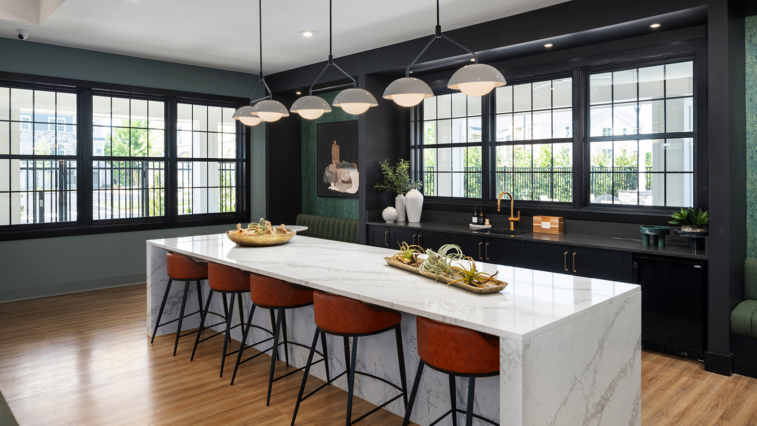 Trailside Village modern clubhouse kitchen with island seating – Trailside Village luxury apartments for rent in Easton, PA