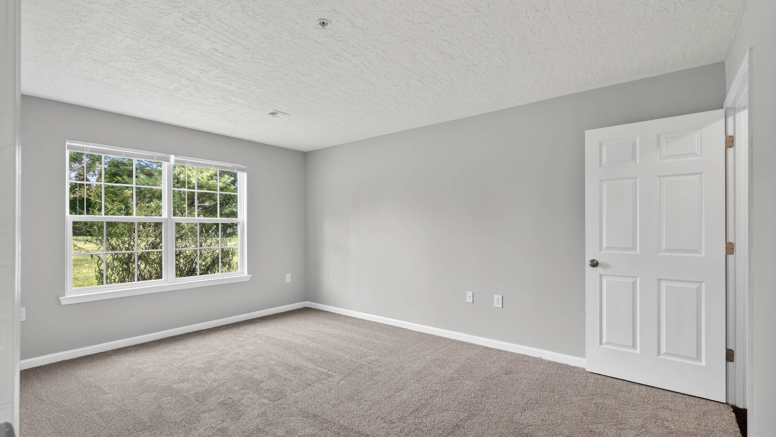 The View at Mackenzi Garden apartment primary bedroom in York, PA – The View at Mackenzi