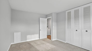 The Reserve at Copper Chase Large primary bedroom with neutral finishes in 1 bedroom apartment in York, PA – The Reserve at Copper Chase
