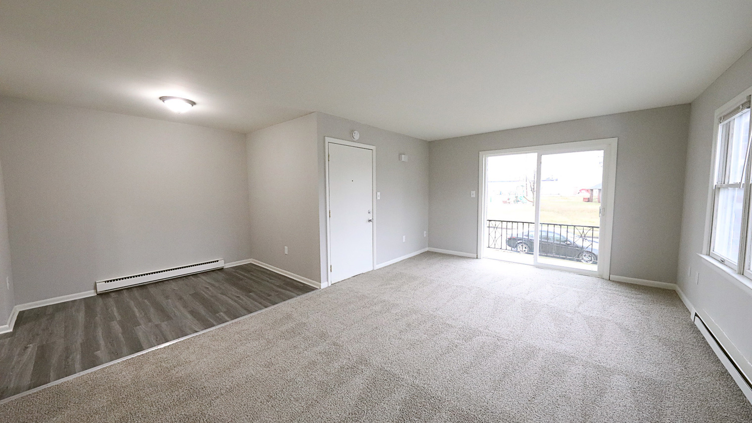 Geraldine Street Apartments Affordable pet-friendly apartment dining room area with balcony in Bethlehem, PA – Geraldine Street Apartments