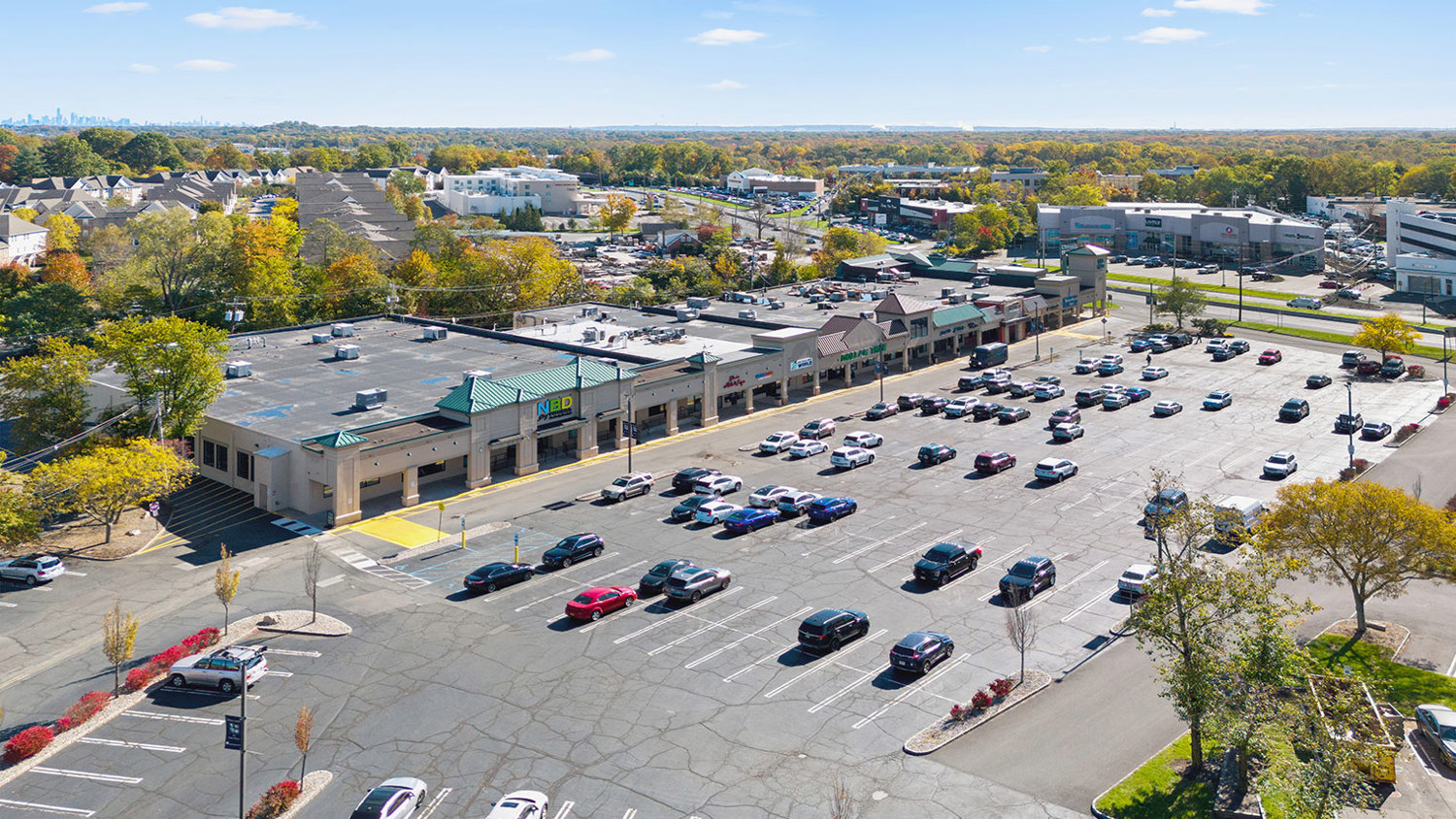Aerial view of community center offering retail space for lease with ample parking in Springfield, NJ – Echo Plaza Shopping Center