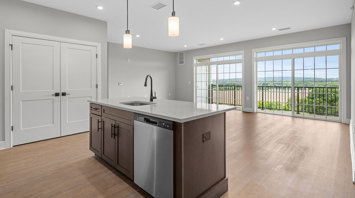 Monte View at Pohatcong Luxury elevator building apartment kitchen with an island and spacious great room in Pohatcong Twp, NJ – Monte View at Pohatcong