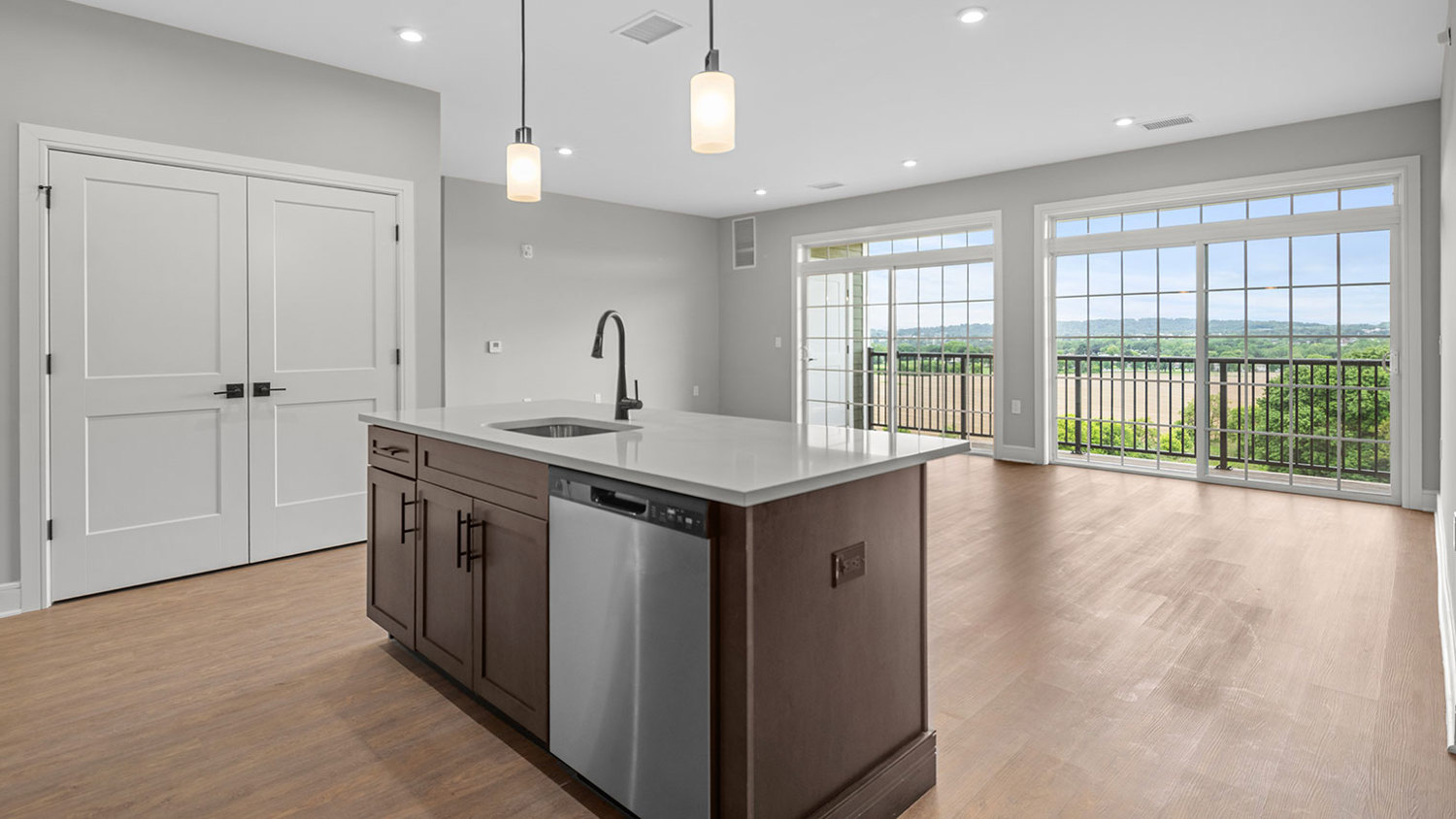 Luxury elevator building apartment kitchen with an island and spacious great room in Pohatcong Twp, NJ – Monte View at Pohatcong