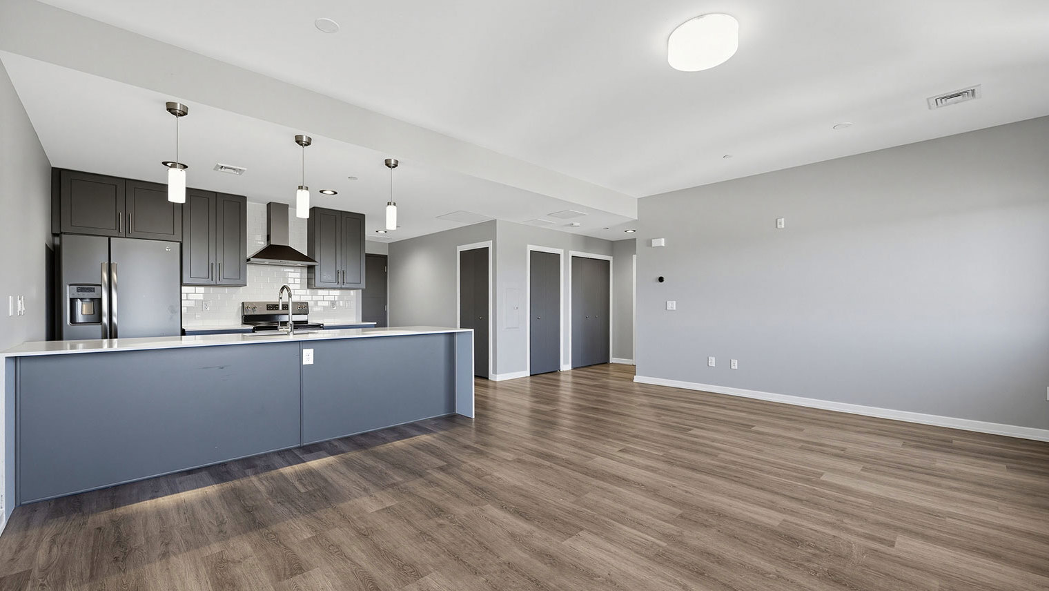 The Pinnacle at 65 Summit 6 Kitchen Living Area 3