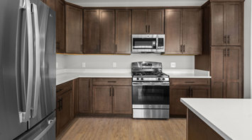 Monte View at Pohatcong Luxury elevator building apartment kitchen with quartz countertops and stainless steel appliances in Pohatcong Twp, NJ – Monte View at Pohatcong