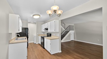 The Reserve at Copper Chase Kitchen and dining area leading to living room - pet friendly apartment rentals York, Pennsylvania - The Reserve at Copper Chase