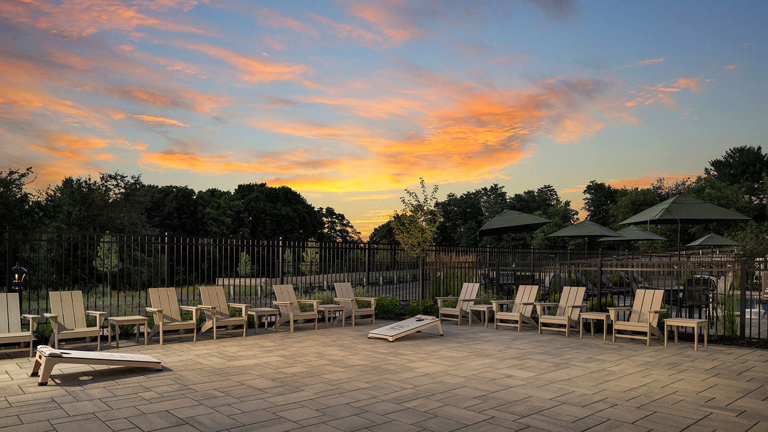 Monte View at Pohatcong Twilight view of pavilion and cornhole at luxury apartment community in Pohatcong, NJ – Monte View at Pohatcong