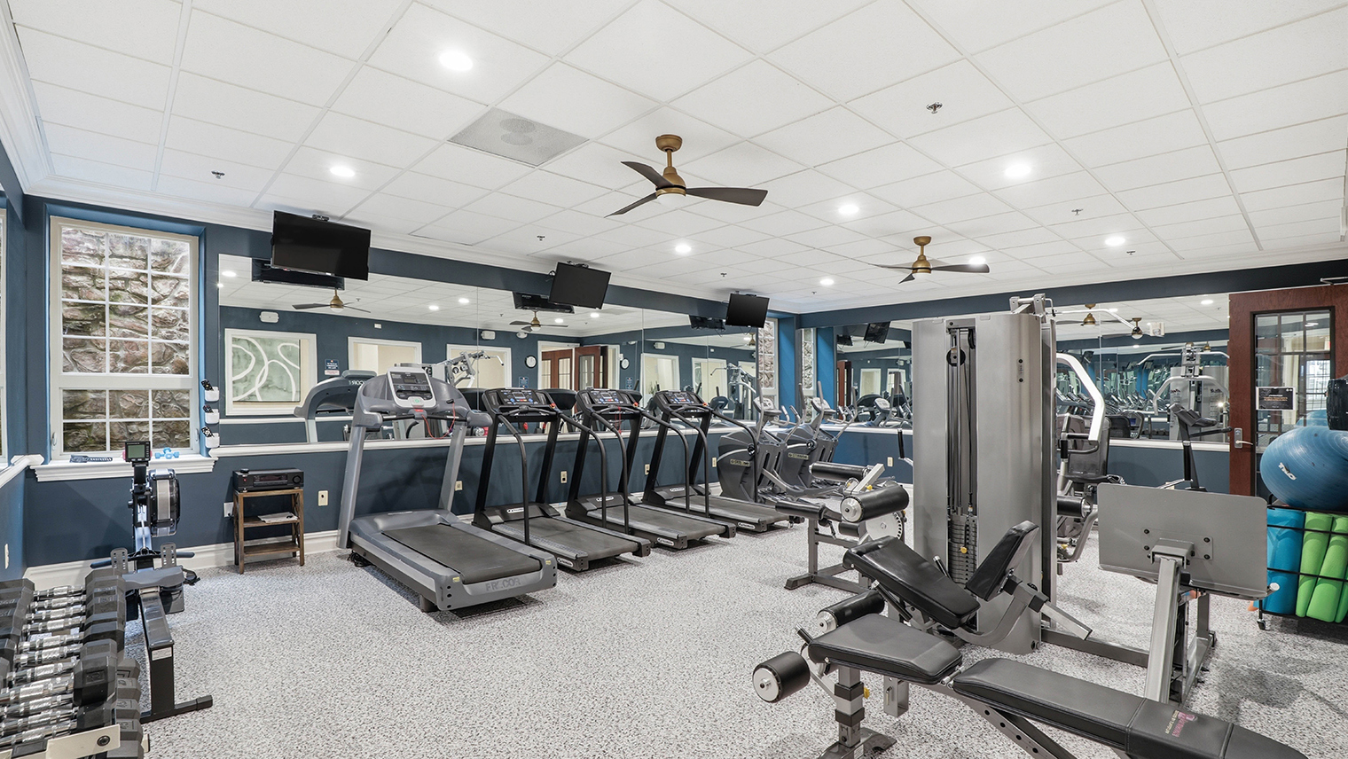Horizons at the Village at Whitehall Fitness center with cardio equipment and weight machines – Horizons at the Village at Whitehall | 55+ Community in Lehigh County, PA