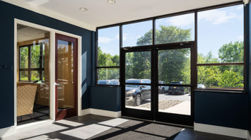 Raritan Commons Modern second-floor elevator entrance with office suite for lease at Raritan Commons in Flemington, NJ