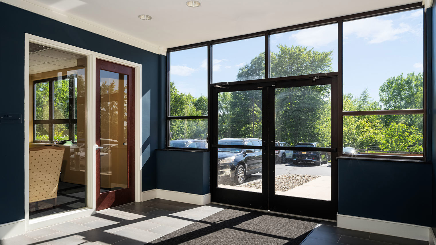 Raritan Commons Modern second-floor elevator entrance with office suite for lease at Raritan Commons in Flemington, NJ