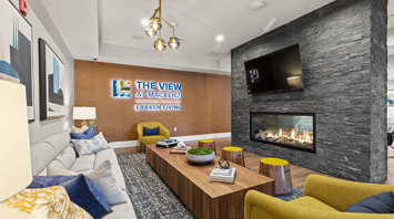 The View at Mackenzi Garden apartments with clubhouse lounge and fireplace in York, PA – The View at Mackenzi