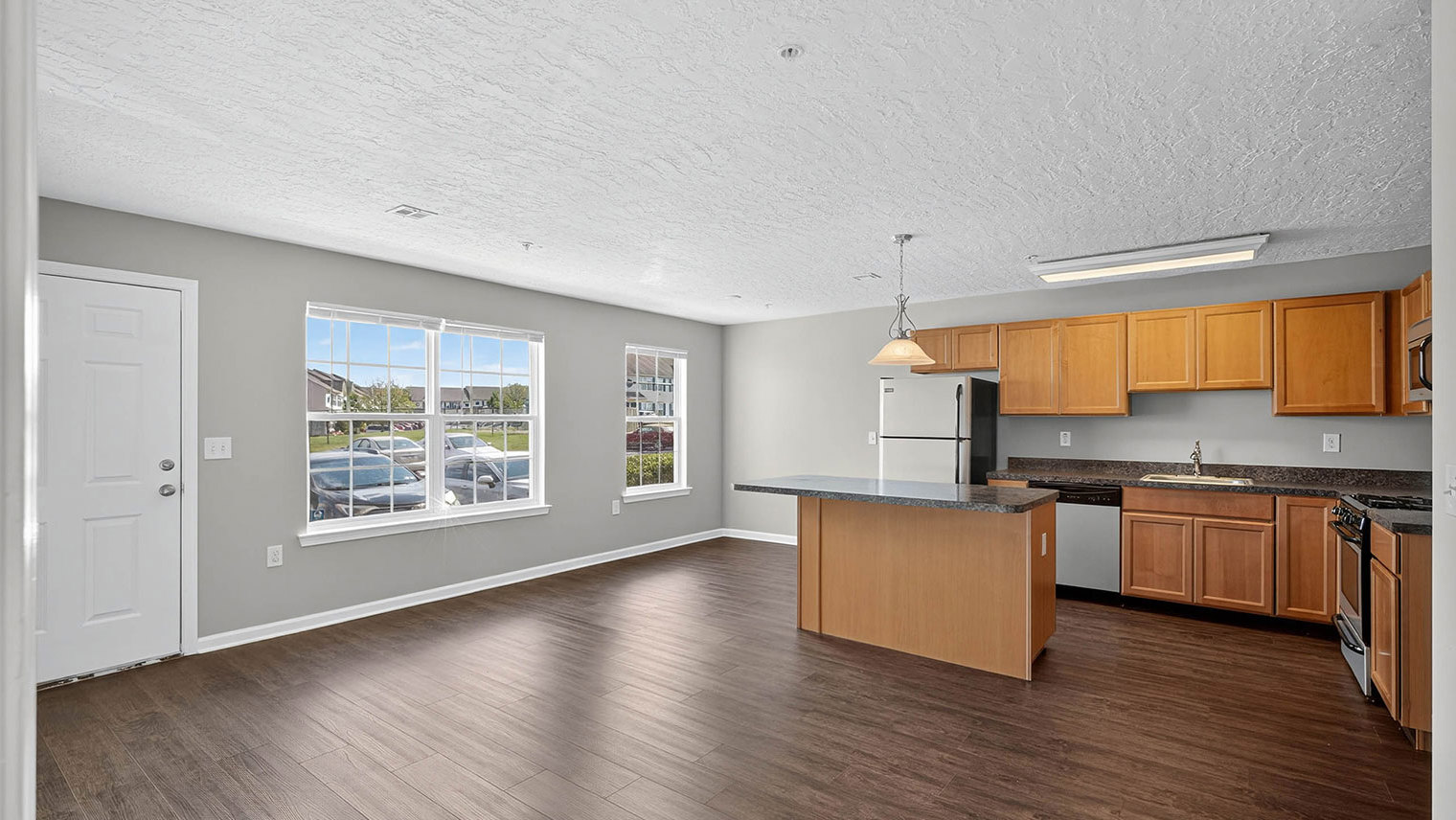 The View at Mackenzi Garden apartment kitchen and living room in York, PA – The View at Mackenzi
